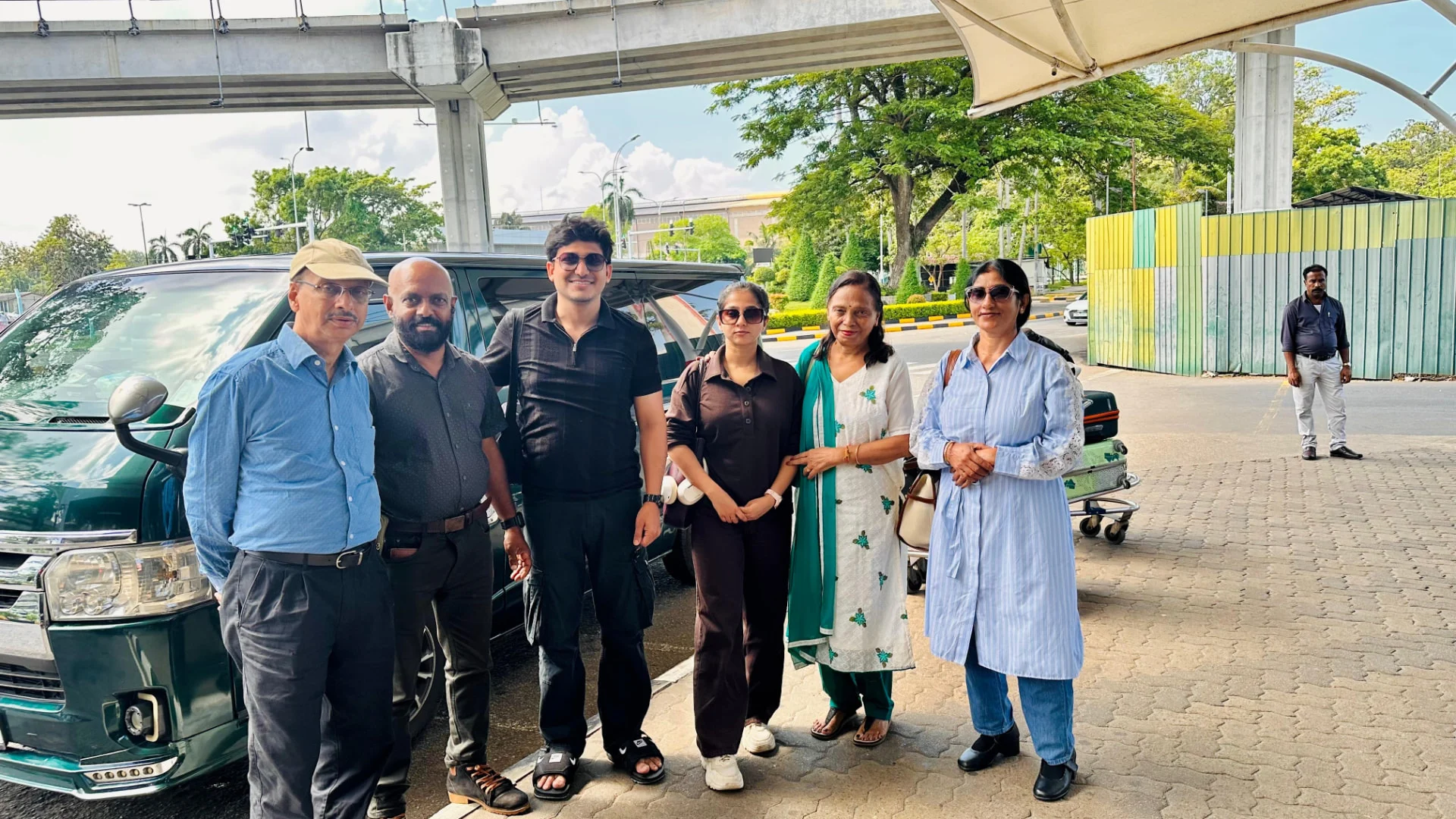 Our happy travelling group beside their van in Sri Lanka